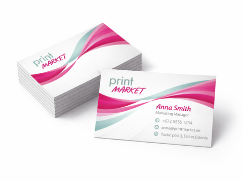 Stack of business cards with a pink and white design on a white background